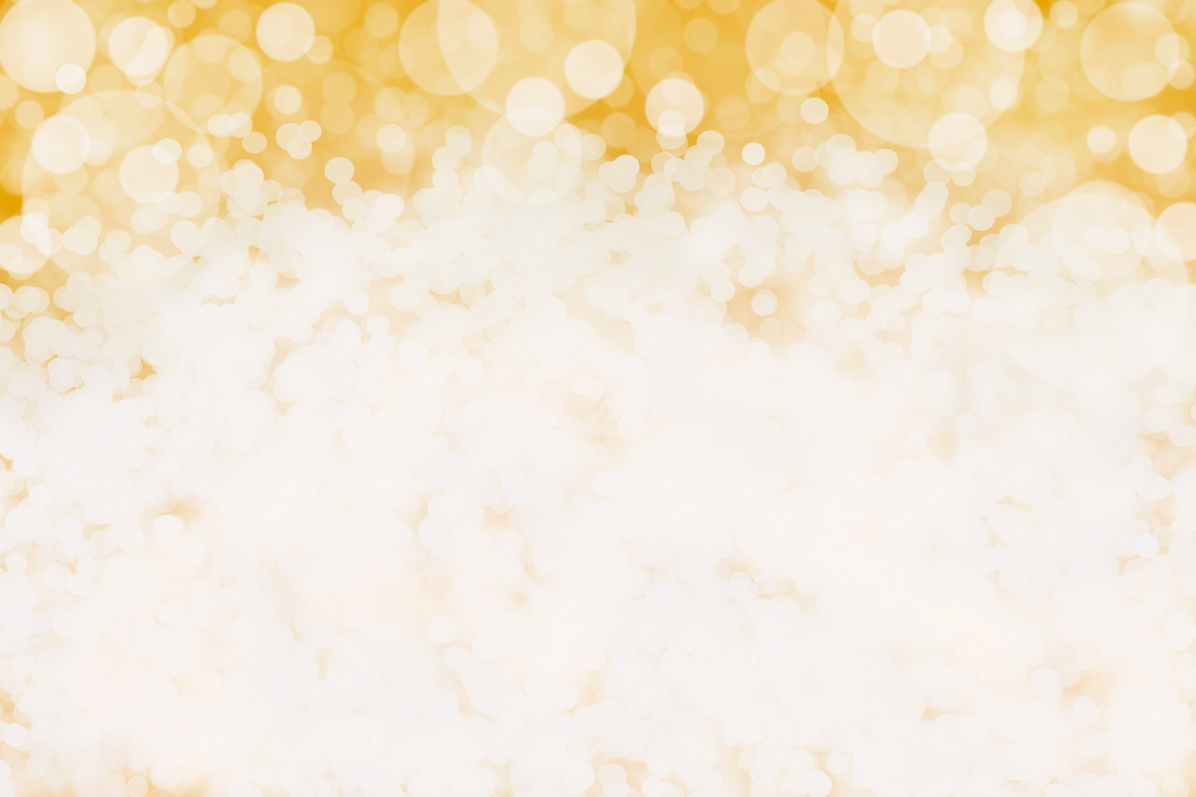 Blurred gold sparkles background